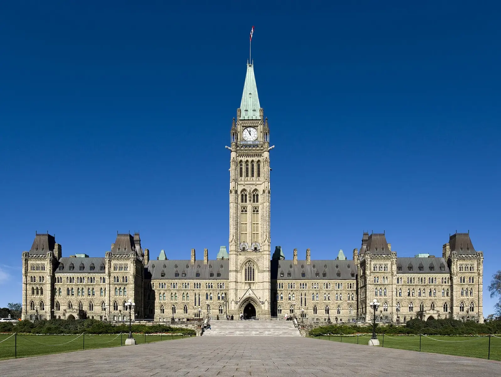 Centre Block and the Peace Tower on Parliament Hill, Ottawa, under a clear blue sky